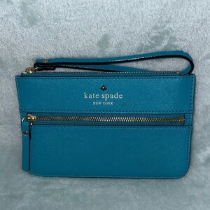 kate spade Bee Mikas Pond Wristlet in a blue color, made of saffiano leather.